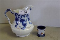 Flow blue pitcher and shot glass