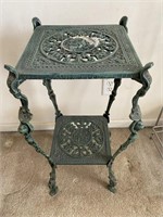 Green metal plant stand 27 inches tall 12 inches