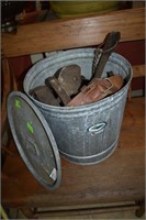 Tin trash can with leather bridles, bits &
