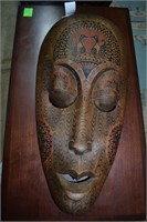 20" L carved wooden face mask