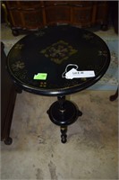 Tole painted round three leg side table in black