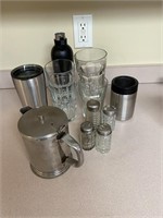 Four (4) glass drinking glasses, stainless steal