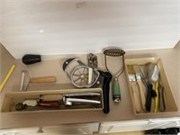 Kitchen gadgets - garlic press, potato masher,