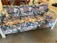 Off-white rattan floral couch
