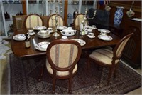 Designer dining table with eight chairs, leaf and