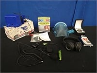 Box with Air Pump, Headphones, Icy Hot Brace, misc