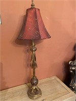 Tall table lamp of bronze and glass