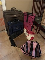 LARGE LOT OF SUITCASES AND BAGS
