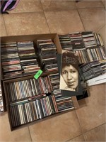 SEVERAL BOXES OF CDS MULTIPLE GENRES