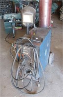 Miller matic 200 welder with compressed gas tank.