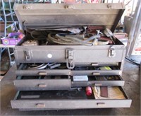 Machinist tool box with various tools including