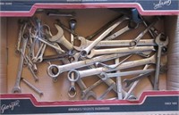 Collection of various size wrenches including