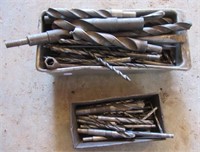 Collection of various size drill bits.