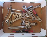 Various tools including wrenches, crows feet,