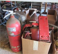 Collection of various size fire extinguishers.