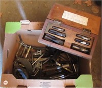 Collection of various tools including taps and