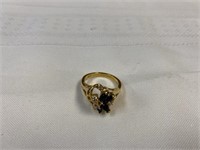 Gold plated clear and black stone ring