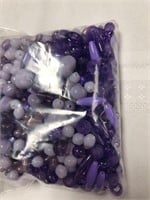 Lot of purple plastic beads \