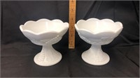 2 milk glass candle holders