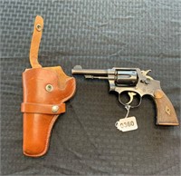 Smith and Wesson 38 special revolver asnd holster