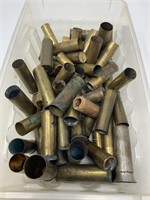 box of full brass shotgun shells some 10 and 12
