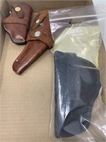 Flat of 3 pistol holsters