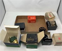 Misc fishing reels in original boxes mostly