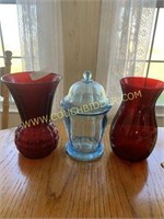 Red Glass Vases and Blue apothecary jar