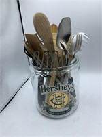 Glass Hershey’s Chocolate jar and kitchen utensils