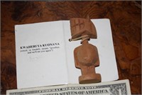 Carved wooden figure with history