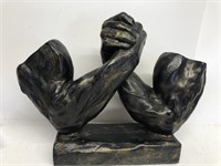 Arm wrestling statue