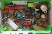 Various tools including allen wrenches, gauges,