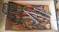 Large collection of screw drivers and nut