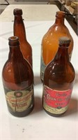 4 vintage beer bottles