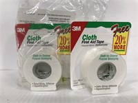 Six new rolls of cloth first aid tape
