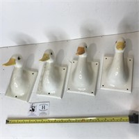 Four Ceramic Gooses Head Wall Hangers