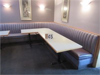 Corner dining booth with table