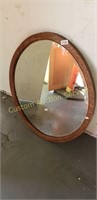 Oval oak beveled mirror 30"x24"