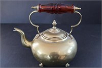 Amber glass handled brass teapot