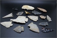 Assortment Native American arrowheads, teeth & art