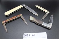 Four pocket knives: Manhard Icelinox, Gerber, Tuf-
