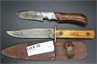 Two skinning knives - one in sheath