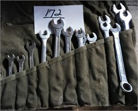 wrenches in green pouch