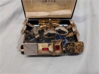 7 sets of cufflinks and tie clips