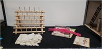 Thread holder with doilies cross stitch books and