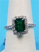 One platinum Ladies' custom made emerald & diamond