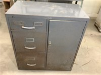Unified Metal filing cabinet. One, very worn 32”