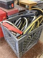 Milk crate with jumper cables and heavy chain