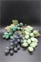 Three hard stone carved grape bunches