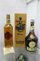 Three collector bottles: Carlos I Brany, DOM B&D L